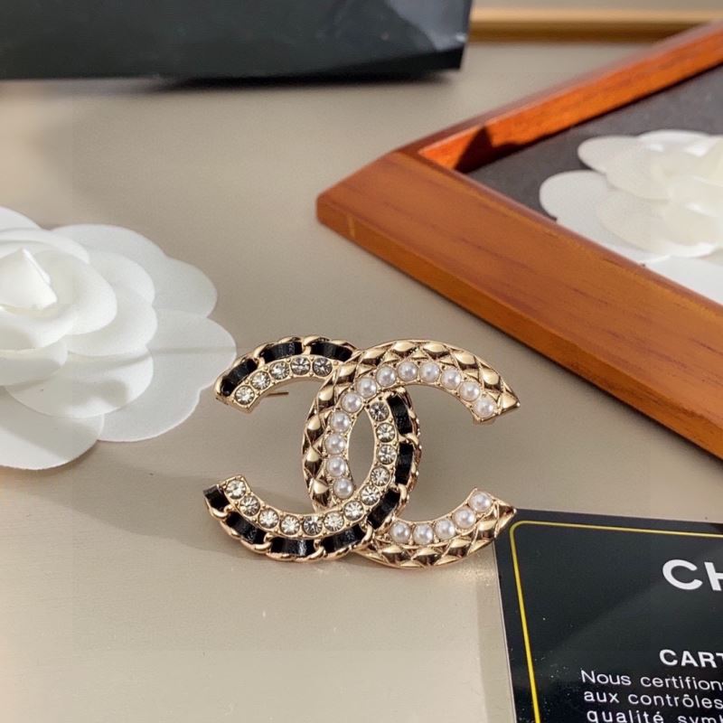 Ch*el brooches